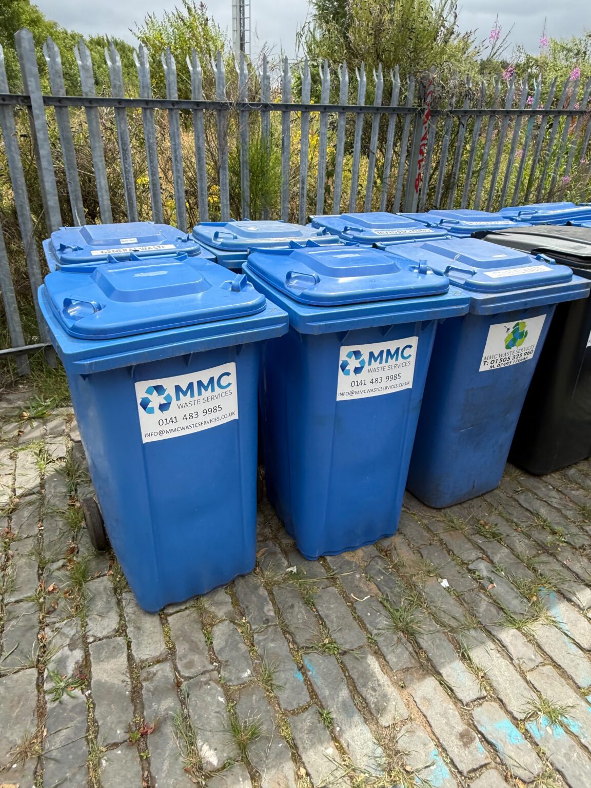 MMC branded wheelie bins ready for bin collection in Glasgow